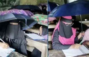 পটুয়াখালীতে বৃষ্টির মধ্যেই ছাতা মাথায় পরীক্ষা দিলেন শিক্ষার্থীরা